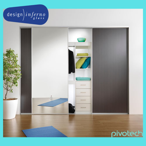 Custom sliding wardrobe door installation by Design Inferno