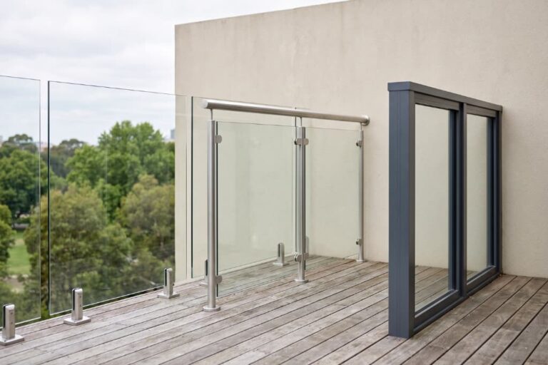 Frameless, semi framed and framed glass balustrades shown side by side on a Melbourne balcony
